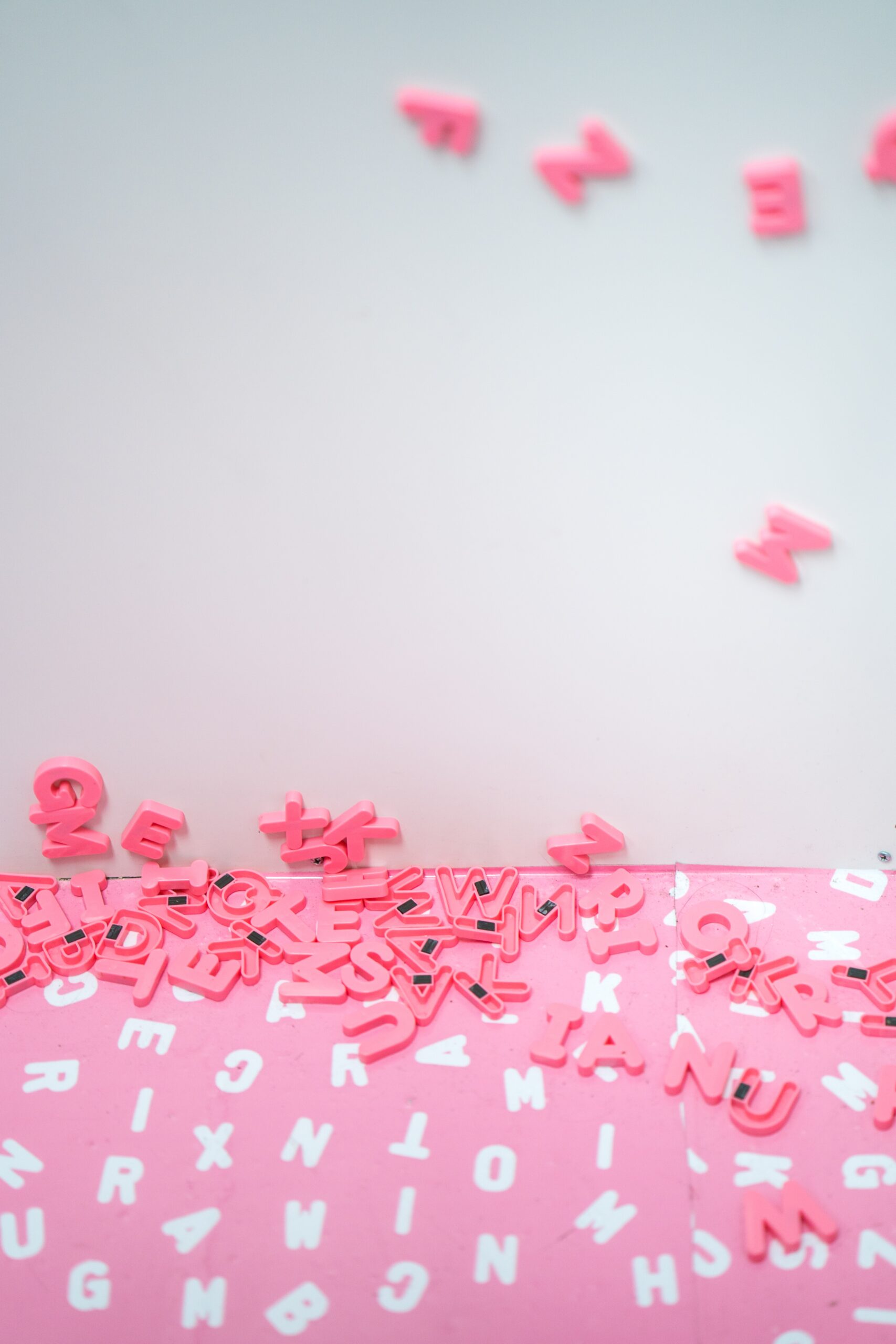 Pink magnets messily together | North Branch Copywriting Co.