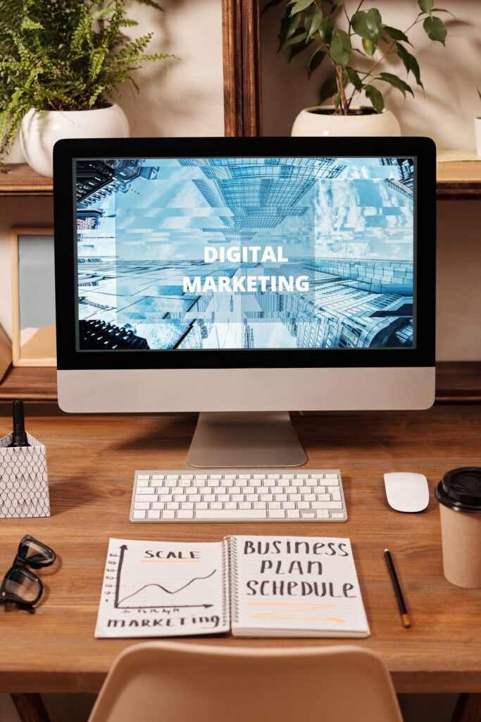 A computer screen saying "Digital marketing" with lead magnet ideas being developed on a note pad | North Branch Copywriting Co. 