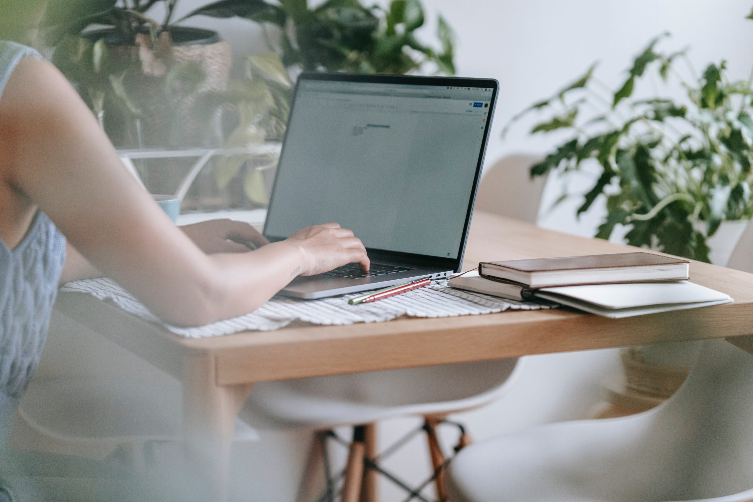 Woman at computer looking for search intent example | North Branch Copywriting Co.