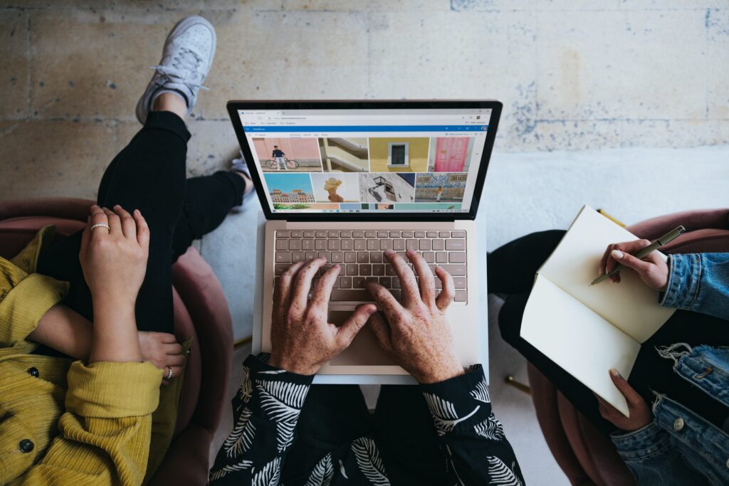 Women in front of computer trying to decide if they will become marketing leads | North Branch Copywriting Co. 